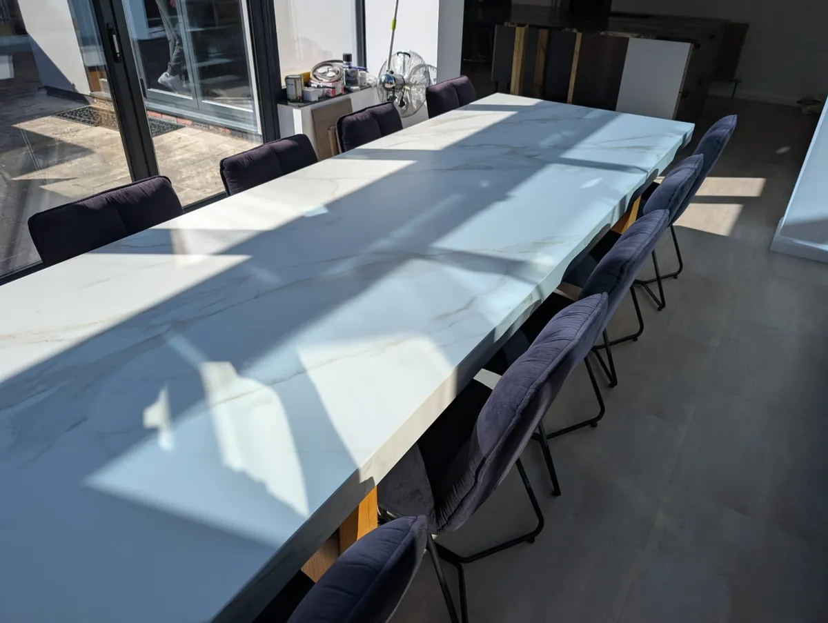 Calacatta Roma Neolith and Cosmic Black granite kitchen worktops